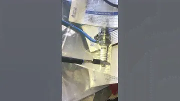 Shop made ignition spark tester, hands free.